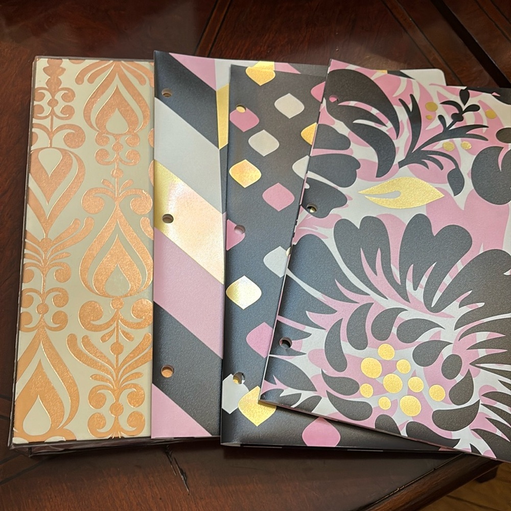 The “Put it in Neutral” collection binder and three printed poly folders.